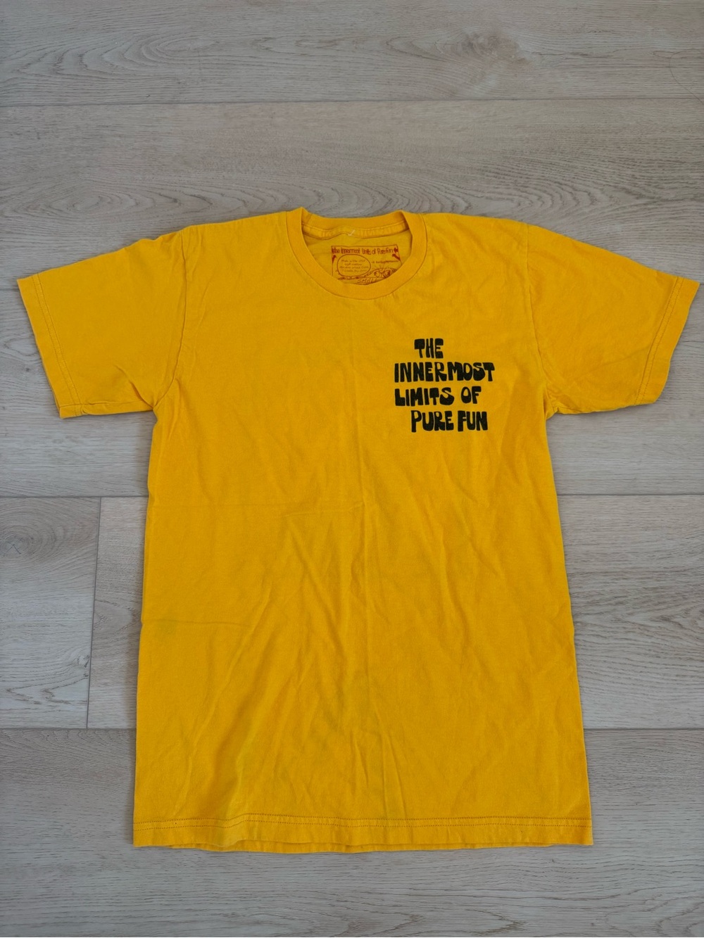 The Innermost Limits of Pure Fun Men’s S Yellow Wave Graphic Logo T-Shirt